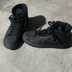 Nike high top sneakers.